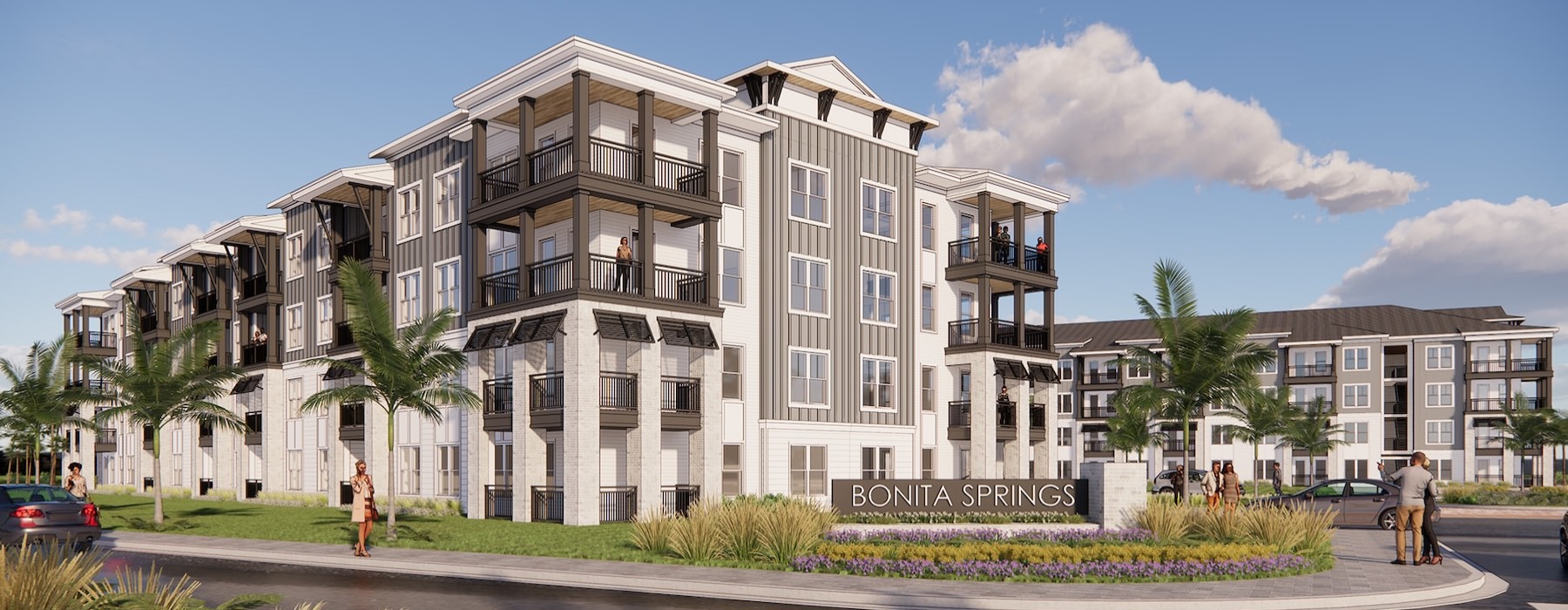 an apartment building with people walking